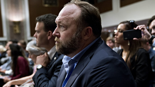 Alex Jones listens during a Senate Intelligence Committee hearing in Washington, DC. 