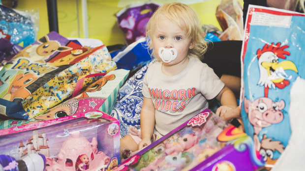 Lily Sidwell, 19 months, staying calm in a sea of showbags at Canberra Hospital.