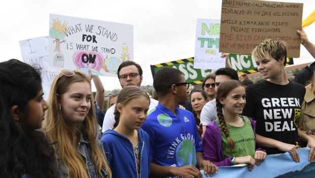 Young climate activists including Greta Thunberg, take their message to Donald Trump's doorstep.