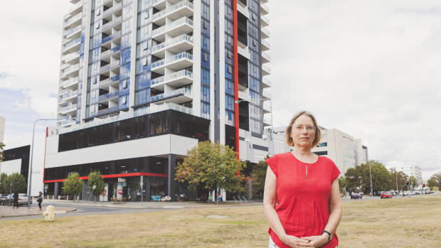Crossbencher Caroline Le Couteur (pictured) stands outside the Sentinel building in Belconnen where west-facing residents say living is "sub-standard".