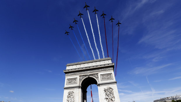 French war planes fly over the Arc de Triomphe in Paris on Bastille Day 2017. Trump is said to have taken inspiration from the event for a new July 4 format. 