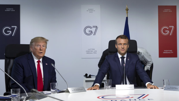 US President Donald Trump and French President Emmanuel Macron attend a working session during the G7 summit in August.