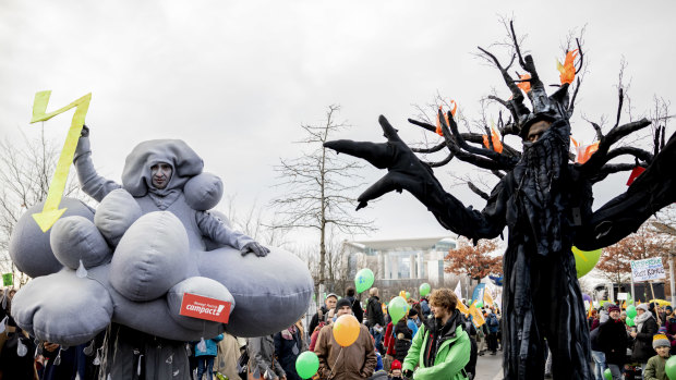 Thousands of people are marched in Berlin and Cologne over the weekend to demand that Germany make a quick exit from coal-fired energy, a day before a UN climate summit opened in neighbouring Poland.