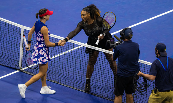 Tomljanovic greets Serena Williams at the net after her famous defeat of the American legend at the 2022 US Open.