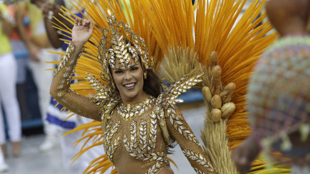 Drum queen Elaine Azevedo from the Unidos da Tijuca samba school performs during Carnival at the Sambadrome on Monday.