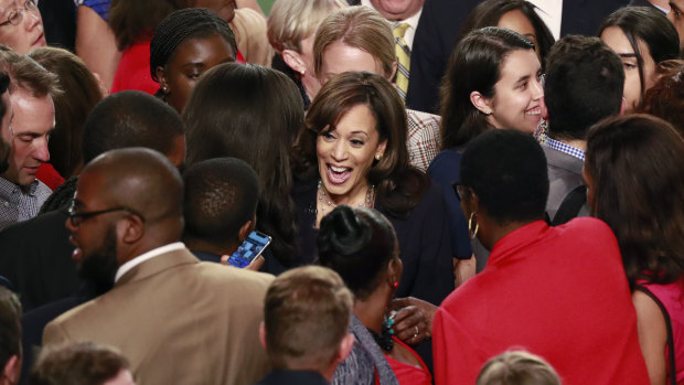 Kamala Harris is surrounded by supporters after the Democratic primary debate hosted by NBC News in Miami.