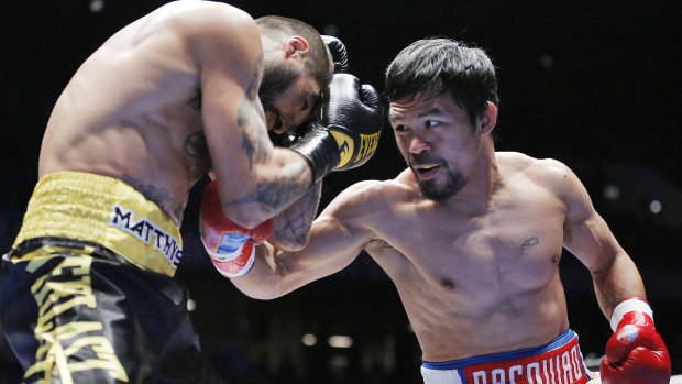The eyes have it: Manny Pacquiao lines up Lucas Matthysse  during their WBA world welterweight title bout.