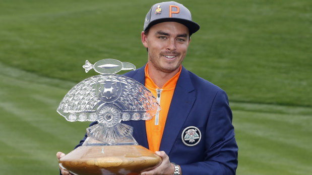 At last: Rickie Fowler can finally smile in Scottsdale after breaking his Scottsdale curse.