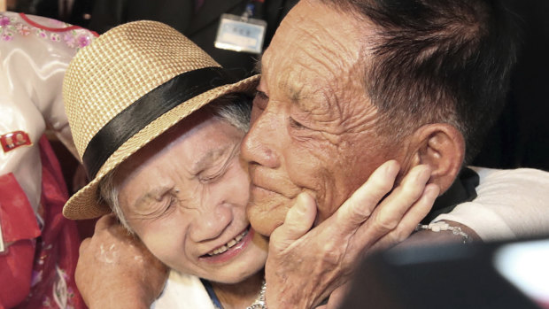 South Korean Lee Keum-seom, 92, left, weeps with her North Korean son Ri Sang Chol, 71, during the Separated Family Reunion Meeting at the Diamond Mountain resort in North Korea.