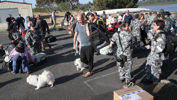 The last Mallacoota evacuees - and their pets - arrived from HMAS Choules in Hastings on Wednesday afternoon. 