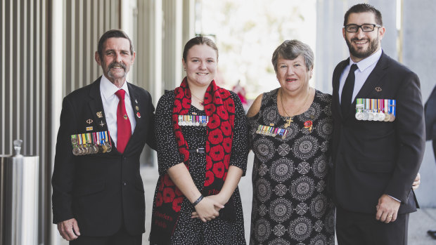 Ray and Pam Palmer, with granddaughter Gabrielle, with Gary Wilson at the Remembrance Day event at the Australian War Memorial