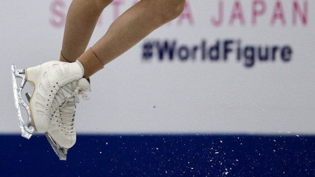 Bell captured performing a jump during the ladies short program in the ISU World Figure Skating Championships in Saitama on Wednesday.