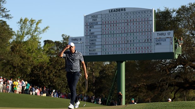 Scottie Scheffler walks up the 18th green before his bizarre four putt double bogey.