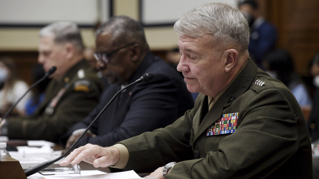 From left, US General Mark Milley, Secretary of Defence Lloyd Austin and Marine Corps General Kenneth McKenzie testify before the House Armed Services Committee on Wednesday.