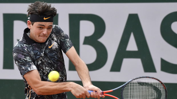 Taylor Fritz proved too strong for Tomic in his 82-minute win.