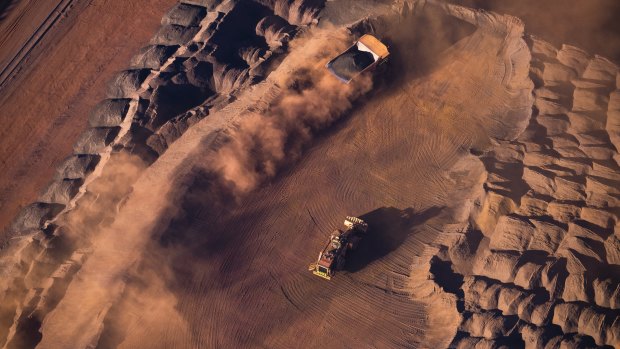 Iron ore miners have helped boost the budget bottom line, tax figures confirm.