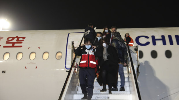 A Chinese aid team arrives at Fiumicino Airport in Rome, carrying members of a medical team and several tons of medical supplies.