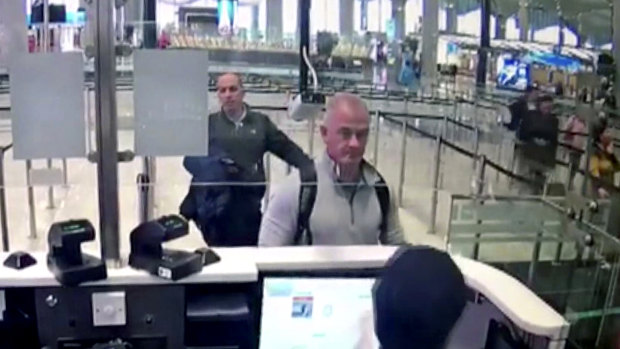 Security camera video shows Michael Taylor, centre, and George-Antoine Zayek at passport control at Istanbul Airport in Turkey in December 2019.