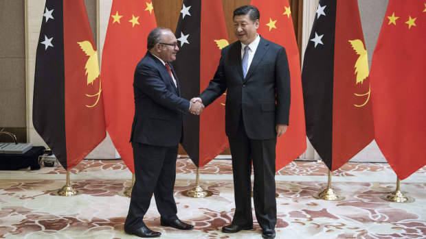 PNG leader Peter O'Neill meets Xi Jinping in Beijing on June 21. China is increasing its influence in PNG.