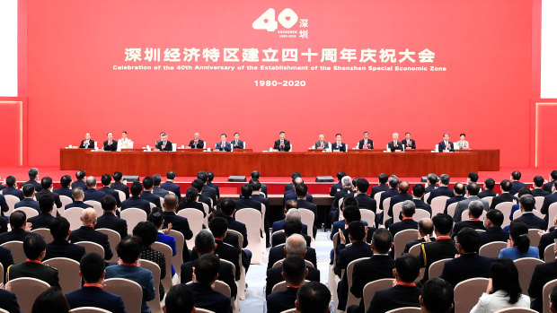 Chinese President Xi Jinping, centre, and other leaders at the 40th anniversary of the establishment of the Shenzhen Special Economic Zone. 