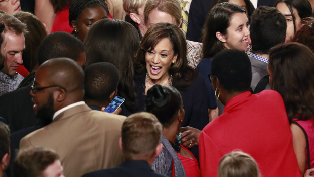 Kamala Harris is surrounded by supporters after the Democratic primary debate hosted by NBC News in Miami.