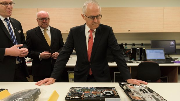 July 2017: Then prime minister Malcolm Turnbull and then attorney-general George Brandis at Australian Federal Police HQ in Sydney for a press conference on cyber security and encryption.  