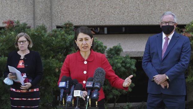 NSW Premier Gladys Berejiklian, with Chief Health Officer Kerry Chant and Health Minister Brad Hazzard, announce the easing of Sydney's lockdown restrictions for the Christmas period.