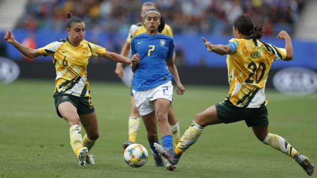 Chloe Logarzo and Sam Kerr pressure Brazil's Andressa Alves Da Silva during the win over the South American giants.