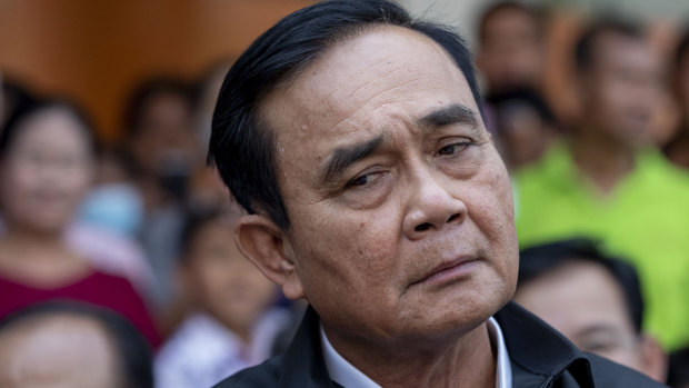 Facinga  censure debate: Thai Prime Minister Prayuth Chan-ocha.