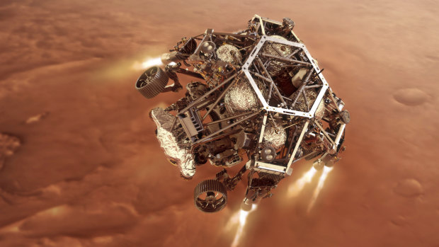 In an artist’s rendering, the Perseverance rover fires up its descent stage engines as it nears the Martian surface.