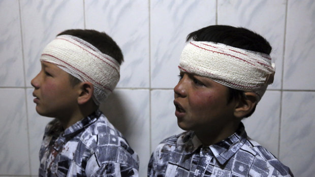 Two brothers wounded by an explosion are wrapped in gauze at a hospital in Kabul, Afghanistan, last week.
