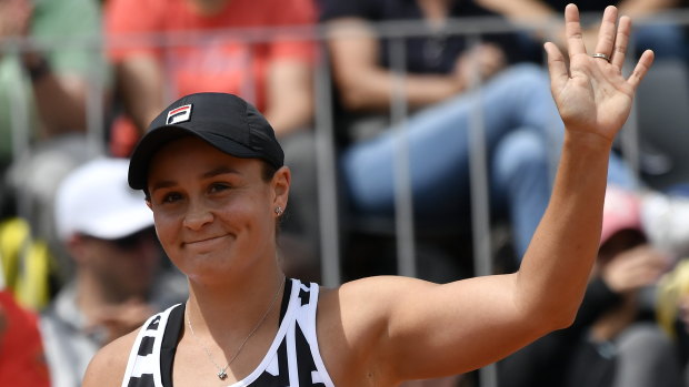 Solid start: Ash Barty salutes the crowd after her first-round win.