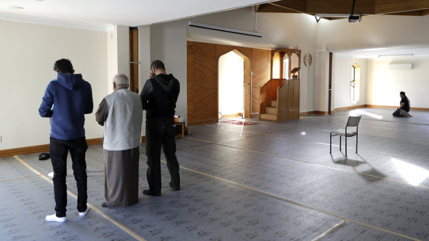 Muslim men pray in the refurbished Al Noor mosque in Christchurch, New Zealand. 