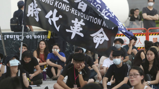 Protesters gather at Democracy Square in Taipei to mark the first anniversary of a mass rally in Hong Kong against the now-withdrawn extradition bill.