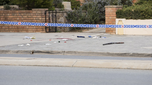 A double-barrel shotgun, which remained visible on Lowe Street, in Queanbeyan, for several hours after the incident on Saturday morning.
