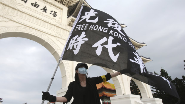 A protester demonstrate in favour of the Hong Kong democracy movement in Taipei in June.