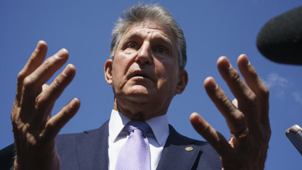 The whole world in his hands? Democratic Senator Joe Manchin has helped torpedo a centrepiece of the Democratic Party’s economic agenda.