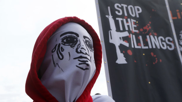 A demonstrator protests against President Rodrigo Duterte's so-called war on drugs in Quezon, northeast of Manila last year.