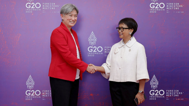Wong is greeted by Indonesia’s Retno Marsudi on Friday.