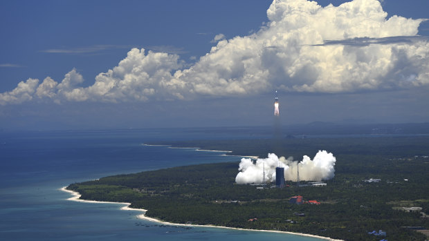 A long distance view of the rocket after lift-off in an attempt to join the United States in successfully landing a spacecraft on the red planet. 