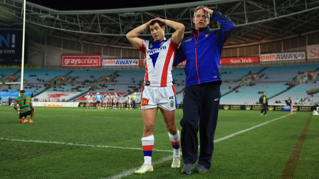 Former Newcastle winger James McManus is helped from the field in 2015.