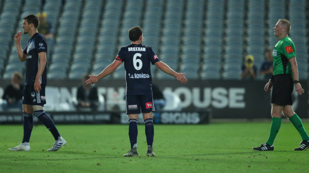 No joy: Victory's Leigh Broxham appeals to the referee after conceding a penalty.