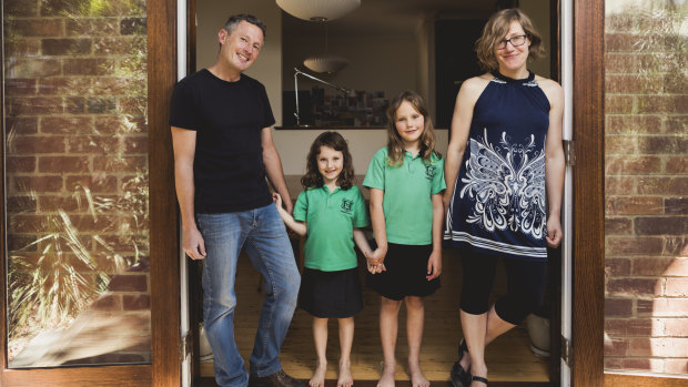 Canberra architect Robbie Gibson has invested into SolarShare, a community run solar farm. Mr Gibson is pictured with his wife Karin Gustavsson, and their children Nelly, 6, and Freya, 9.