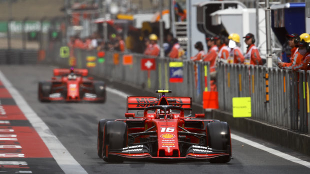 Ferrari's Charles Leclerc leads out teammate Sebastian Vettel.