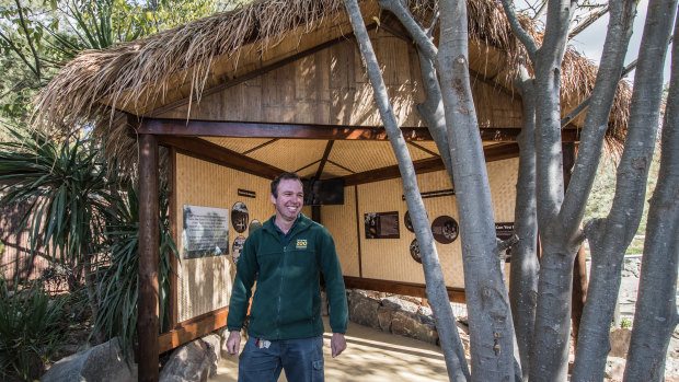 Zookeeper Brendan Sheean inside the new tree kangaroo conservation hut.