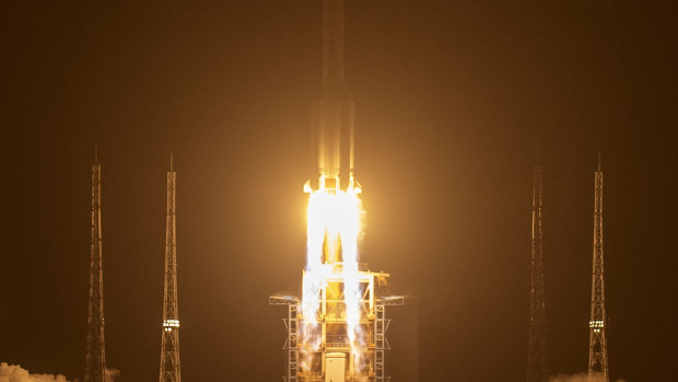 A Long March-5 rocket carrying the Chang'e 5 lunar mission lifts off at the Wenchang Space Launch Centre in Wenchang in southern China's Hainan Province.