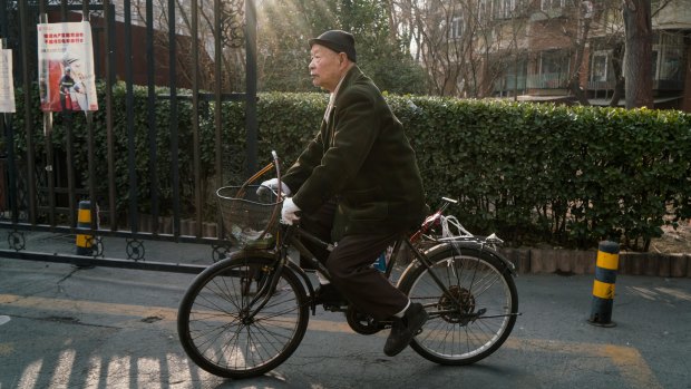 Han Zicheng, 85, rides his bicycle to a market in Tianjin, China, in January.