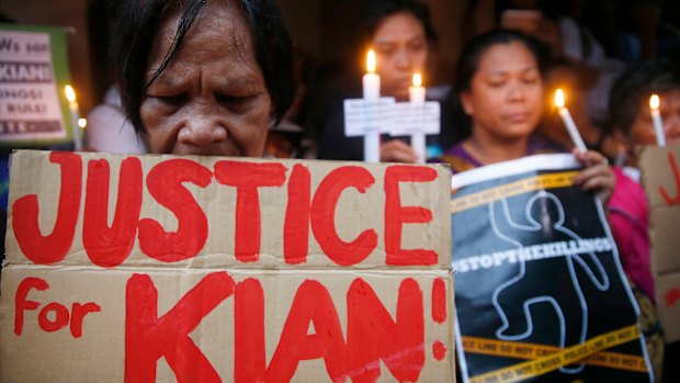 Protesters call for justice for slain teen KIan Loyd Delos Santos last year.