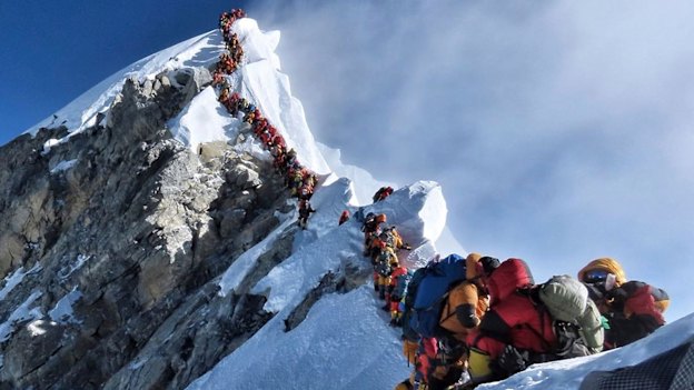 Climbers on Everest on May 22 this year. Long delays increase the risk that climbers will run out of oxygen: “If you’ve got to wait in a bloody queue, you’re knocking on heaven’s door,” says Australian climber Greg Mortimer.