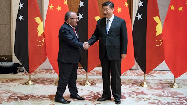 PNG leader Peter O'Neill meets Xi Jinping in Beijing on June 21.